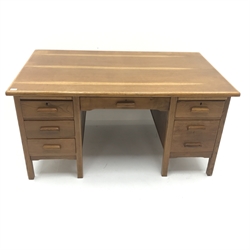 20th century medium oak desk, two slides, single frieze and six drawers, square supports, W152cm, H76cm, D91cm