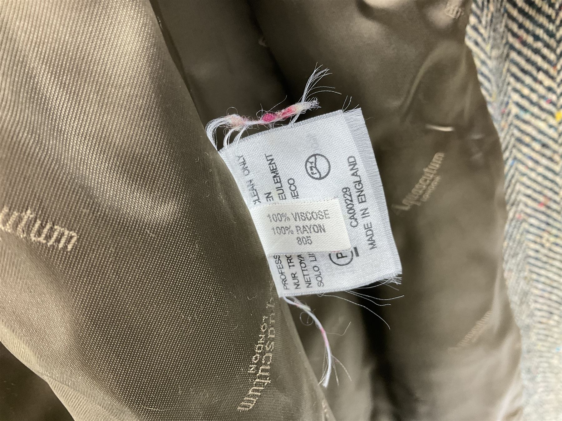 Men's Aquascutum lambs wool herringbone tweed coat with silk lining, 46 Reg, together with a further Men's Aquascutum grey wool duffle coat, with cheque lining and horn buttons, 46