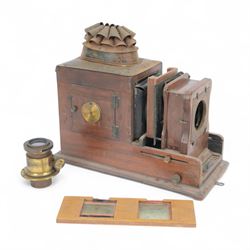 Late 19th century/early 20th century brass mounted mahogany magic lantern with brass lens