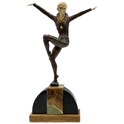 After Demetre Chiparus (1886-1947), Art Deco style figure modelled after The Dancer of Kapurthala, with ivorine head and handles, signed D H Chiparus, raised upon an onyx plinth with curved supports and rectangular base, overall H32cm