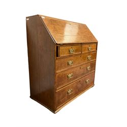 George III oak bureau, fall-front enclosing fitted interior with central cupboard and two correspondence drawers, fitted with two short over three long graduating drawers with cock-beaded facias