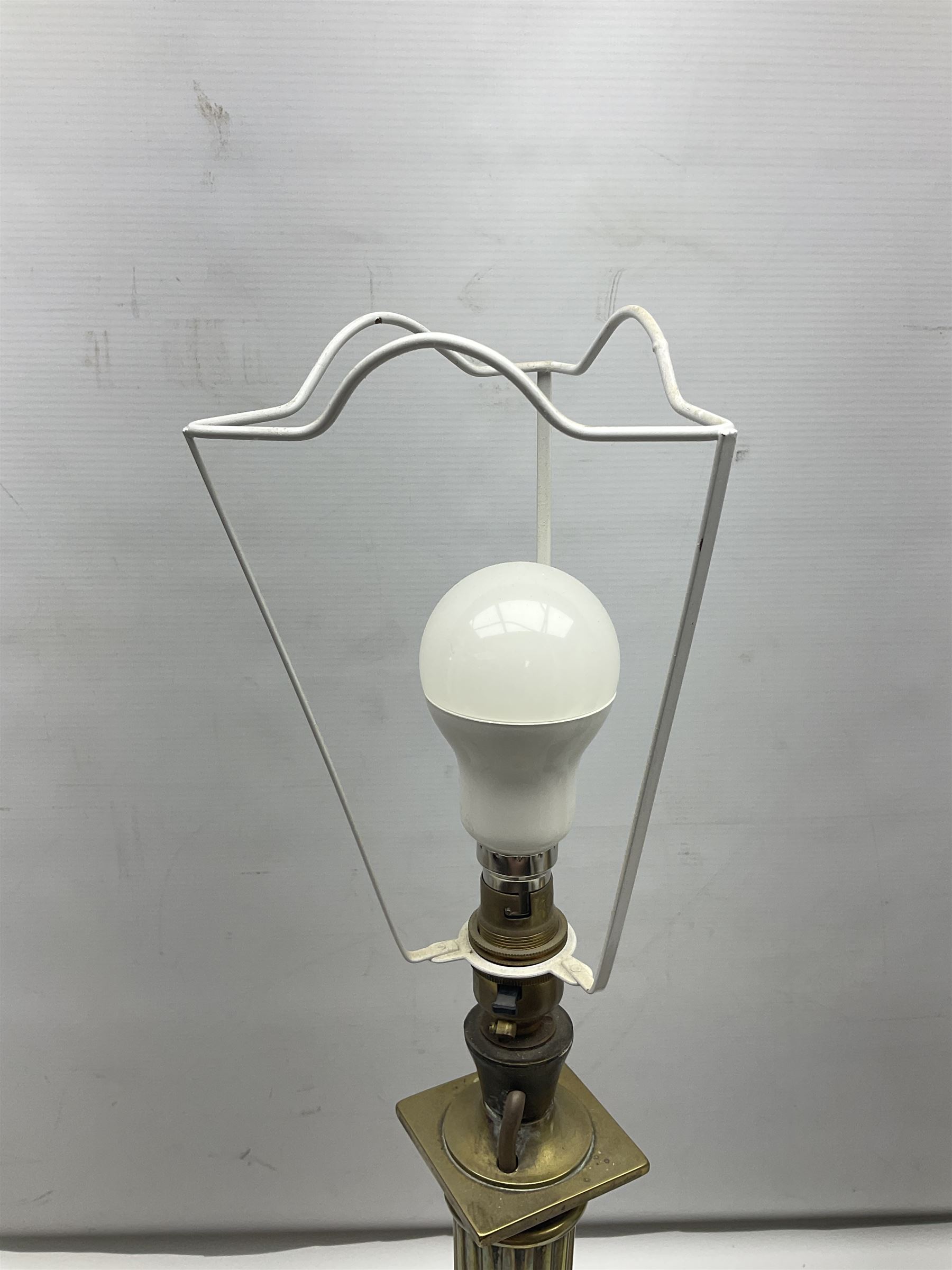 Brass table lamp in the form of a Corinthian column, together with a converted oil lamp, tallest without lightbulb H50cm