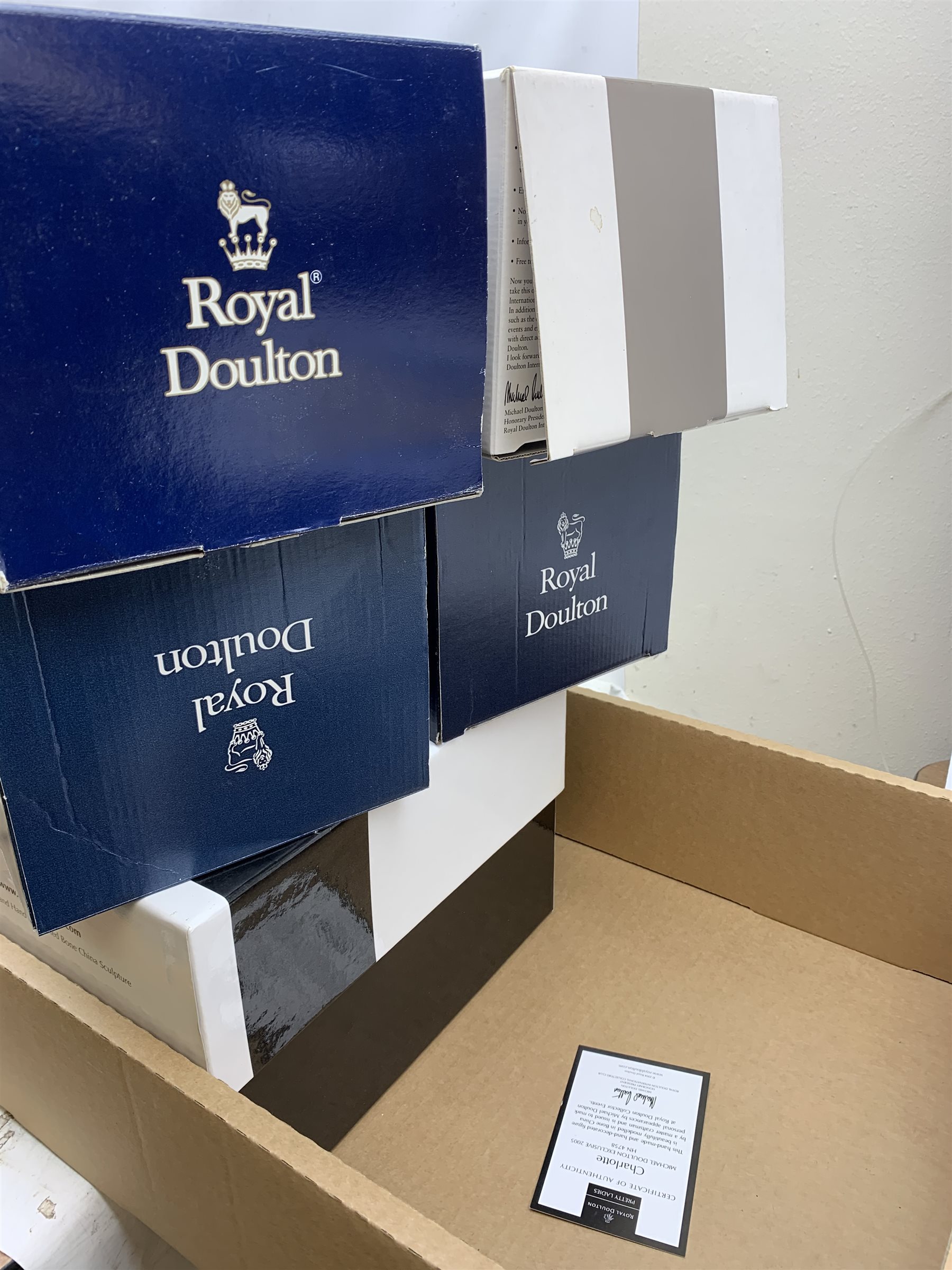A group of five boxes Royal Doulton figurines, comprising Lesley HN2410, Helen HN3601, Moonlight Stroll HN3954, Classics Figure of the Year 2003 Elizabeth HN4426, Pretty Ladies Charlotte HN4758, with accompanying certificate. (5). 