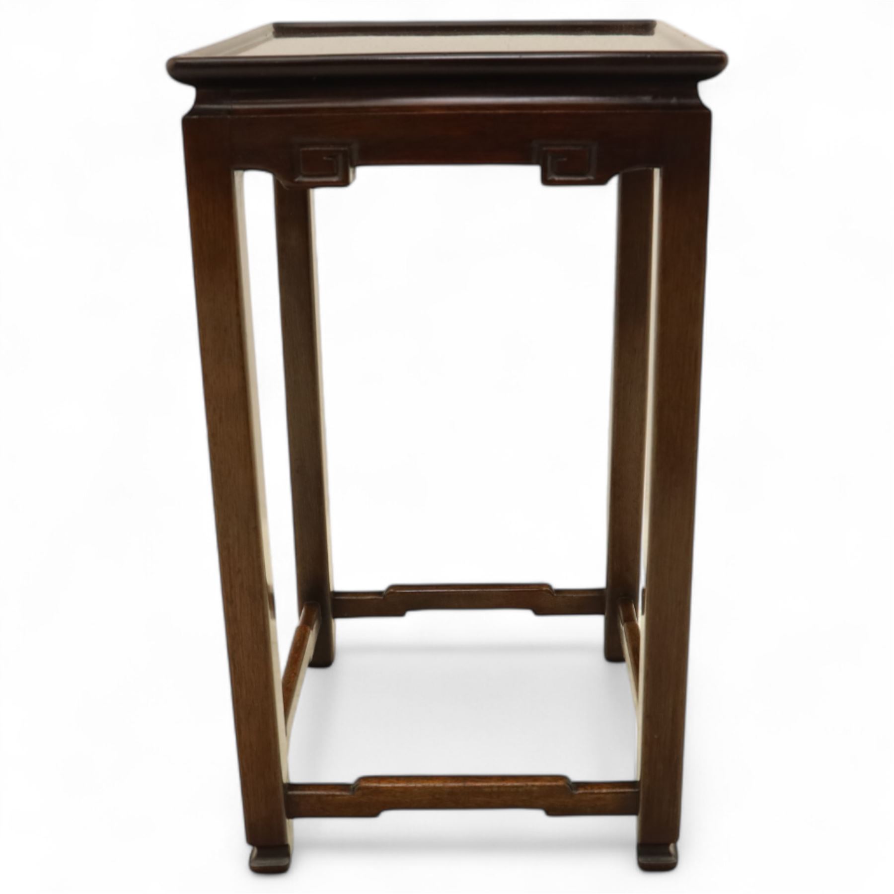 Whytock & Reid, Edinburgh  - Edwardian nest of three Chinese-style solid mahogany occasional tables, rectangular top with finely moulded edge above slim square section legs with subtly chamfered inner edges, joined by H-shaped stretchers, largest W40xD33xH52cm