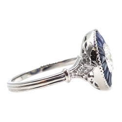 Platinum (tested) diamond and sapphire target ring, the central diamond approx 0.5 carat  