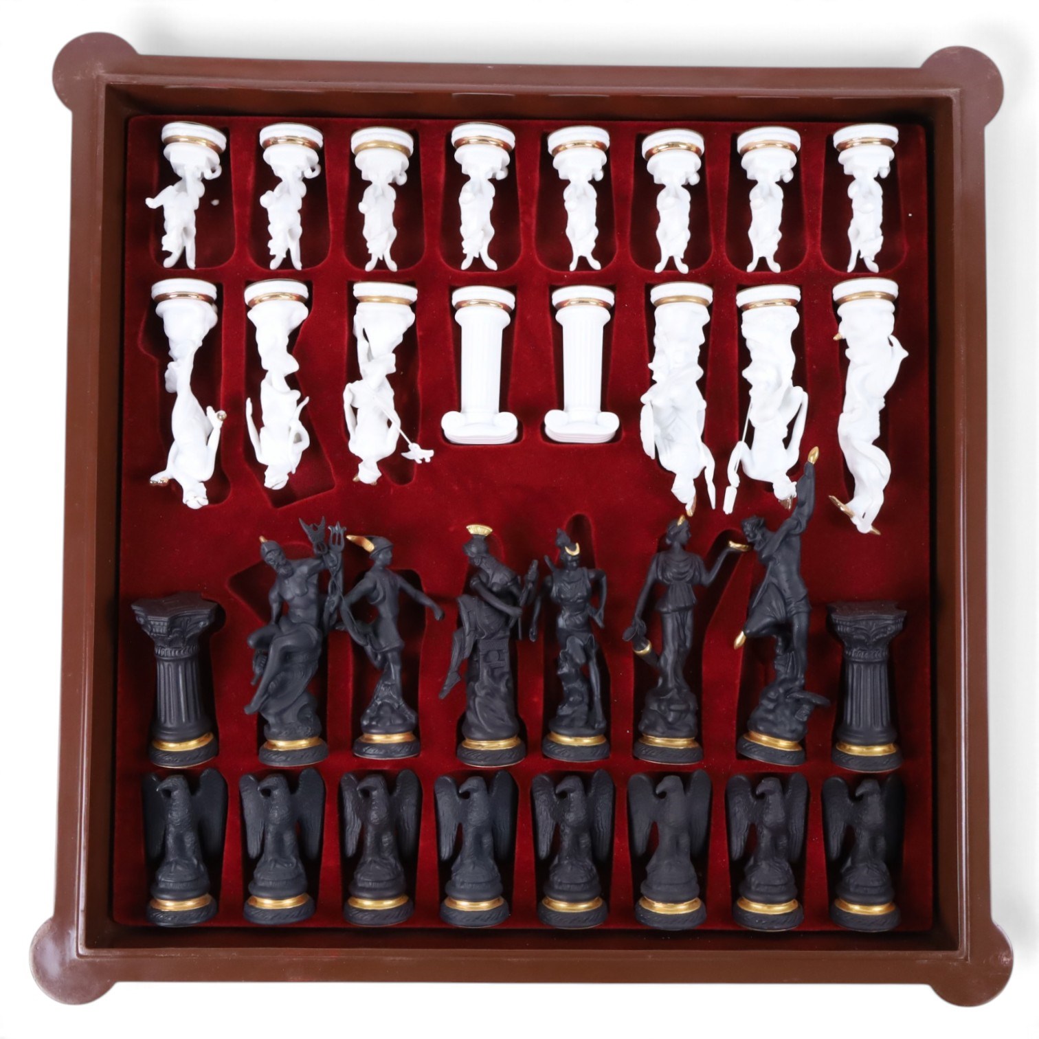 Franklin Mint - The Chess set of the Gods by Stuart Feldman, porcelain pieces, housed in fitted case with certificates 