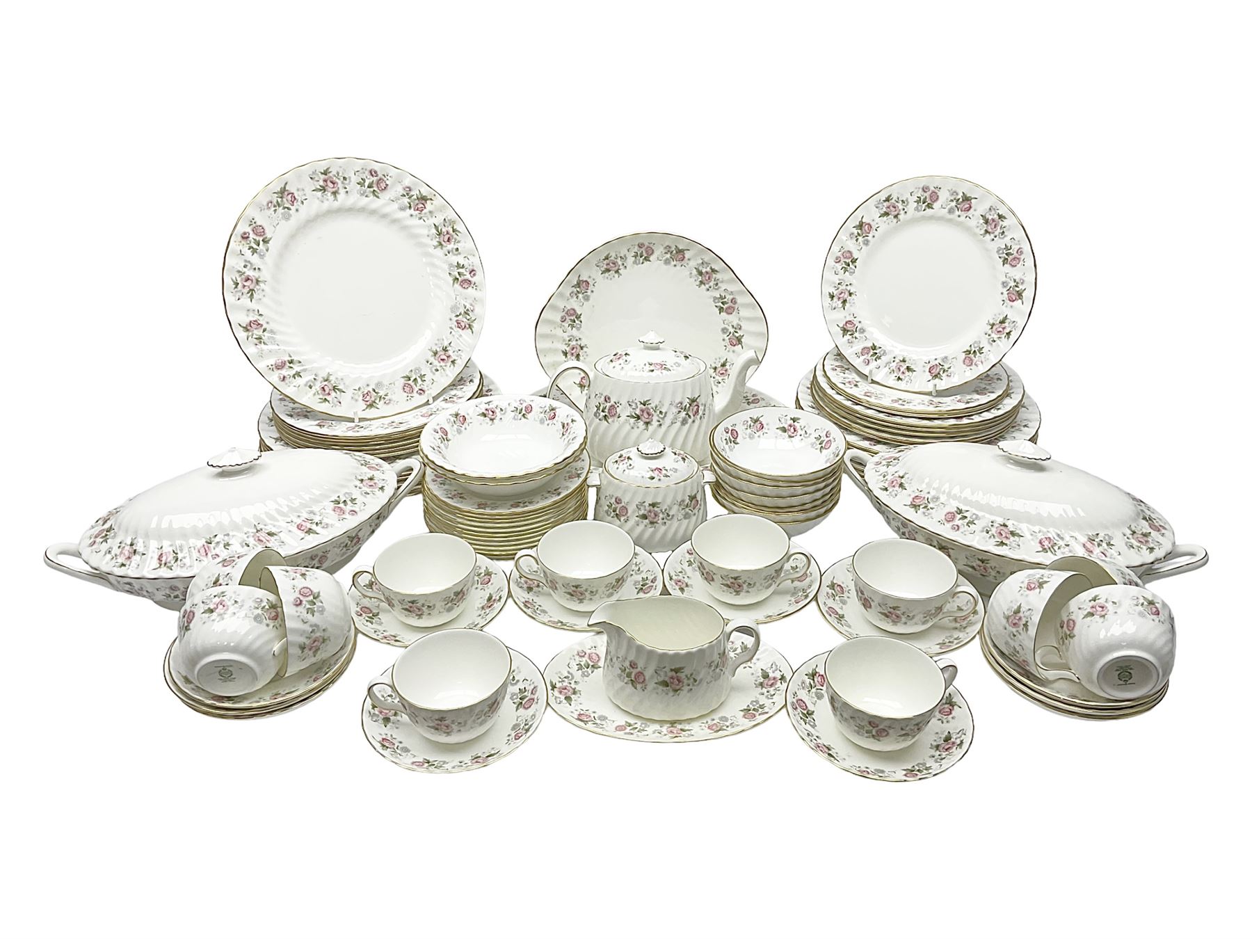 Minton Spring Bouquet pattern dinner and tea service, comprising dinner plates, twin handled tureens with covers, meat platter, teapot, milk jug, sugar bowl with cover, tea cups and saucers, bowls, cake plate, side plates, dessert plates, etc all with printed mark beneath (82)