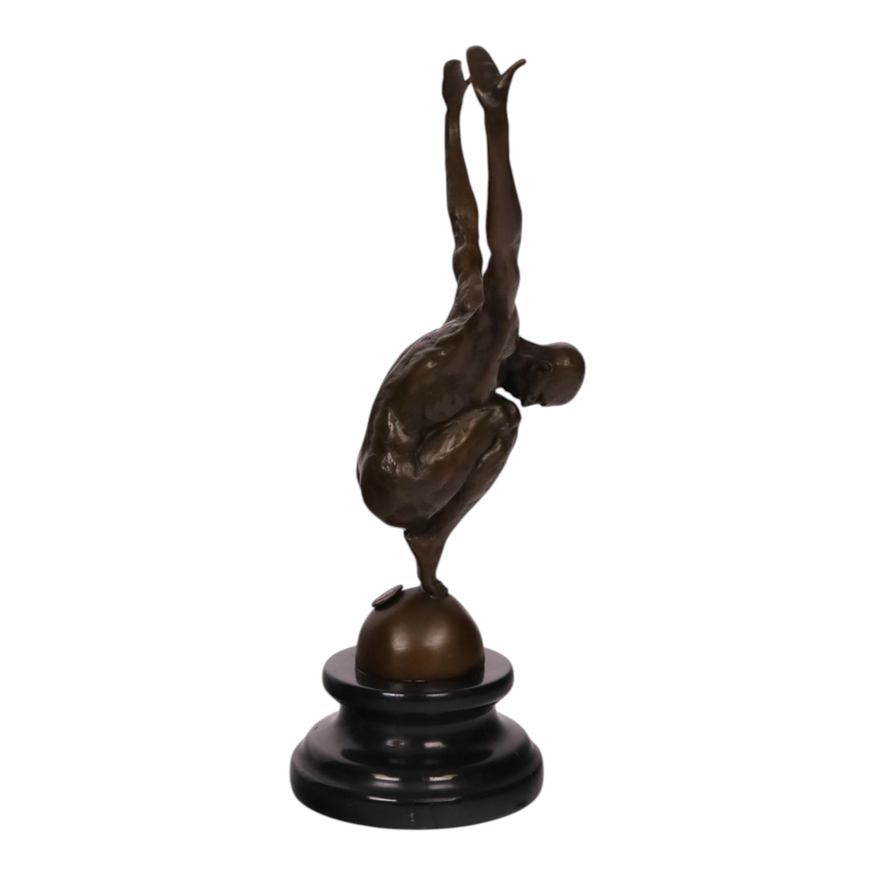 After Milo - bronze figure of a man in perfect balance, bearing signature and foundry mark, overall H29cm