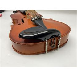 Four student violins - two Chinese three-quarter size with 33.5cm and 34cm two-piece backs; Stringers of Edinburgh quarter size with 28cm two-piece back; and Stentor quarter size with 28cm two-piece back; each in carrying case (4)