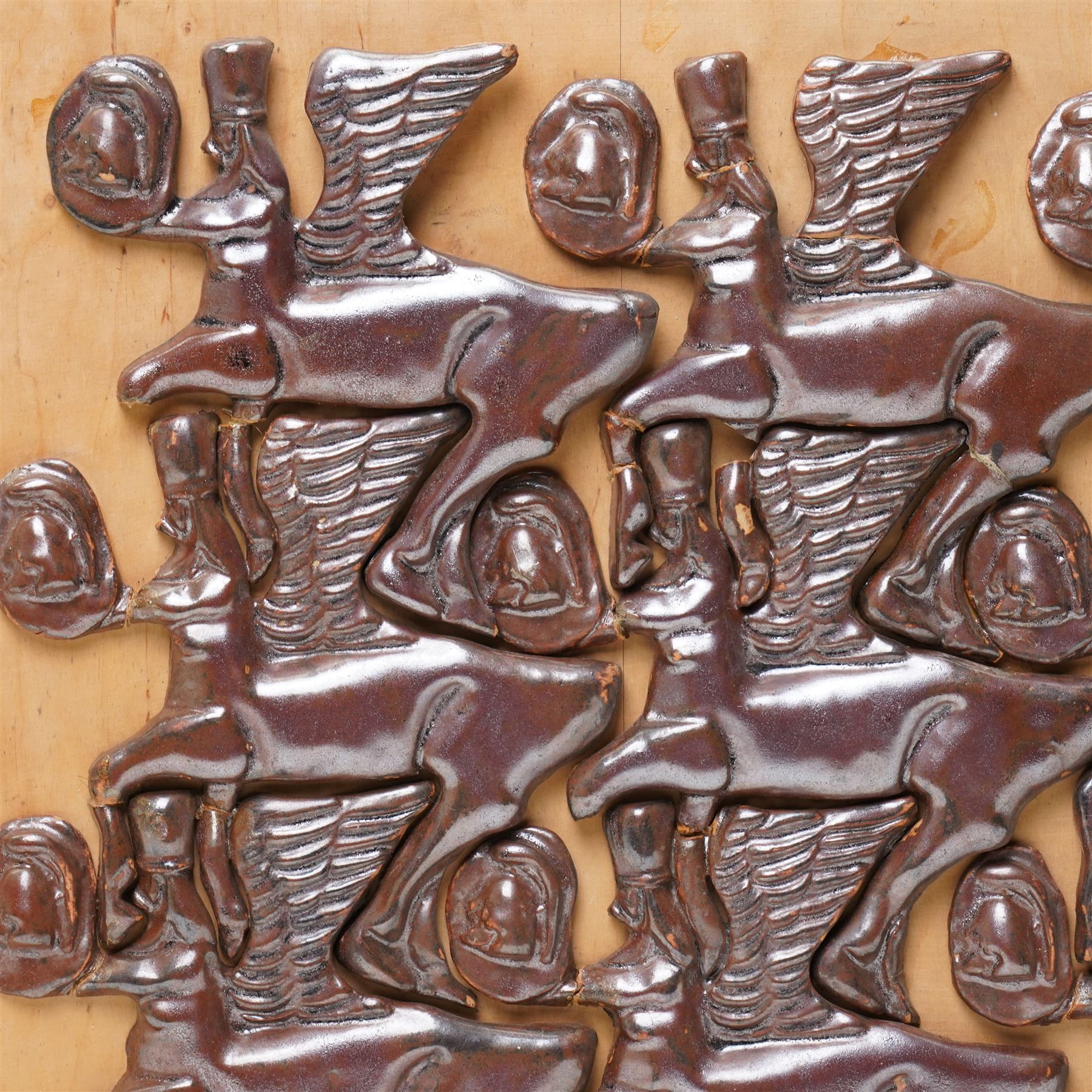 Mounted glazed tiles of the Assyrian god Ashur 38cm x 48cm overall