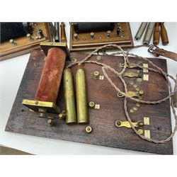 Heeling Error Instrument Patt.5 No.1613E (box numbered 1810E) with integrated spirit level D11cm; two walnut cased electric shock machines; and a similar board mounted electric shock machine (4)