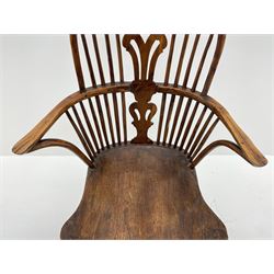 Late 18th century yew wood and elm Windsor armchair, double hoop and stick back with pierced 'Chippendale' type splat, dished saddle seat, on cabriole supports joined by H stretcher