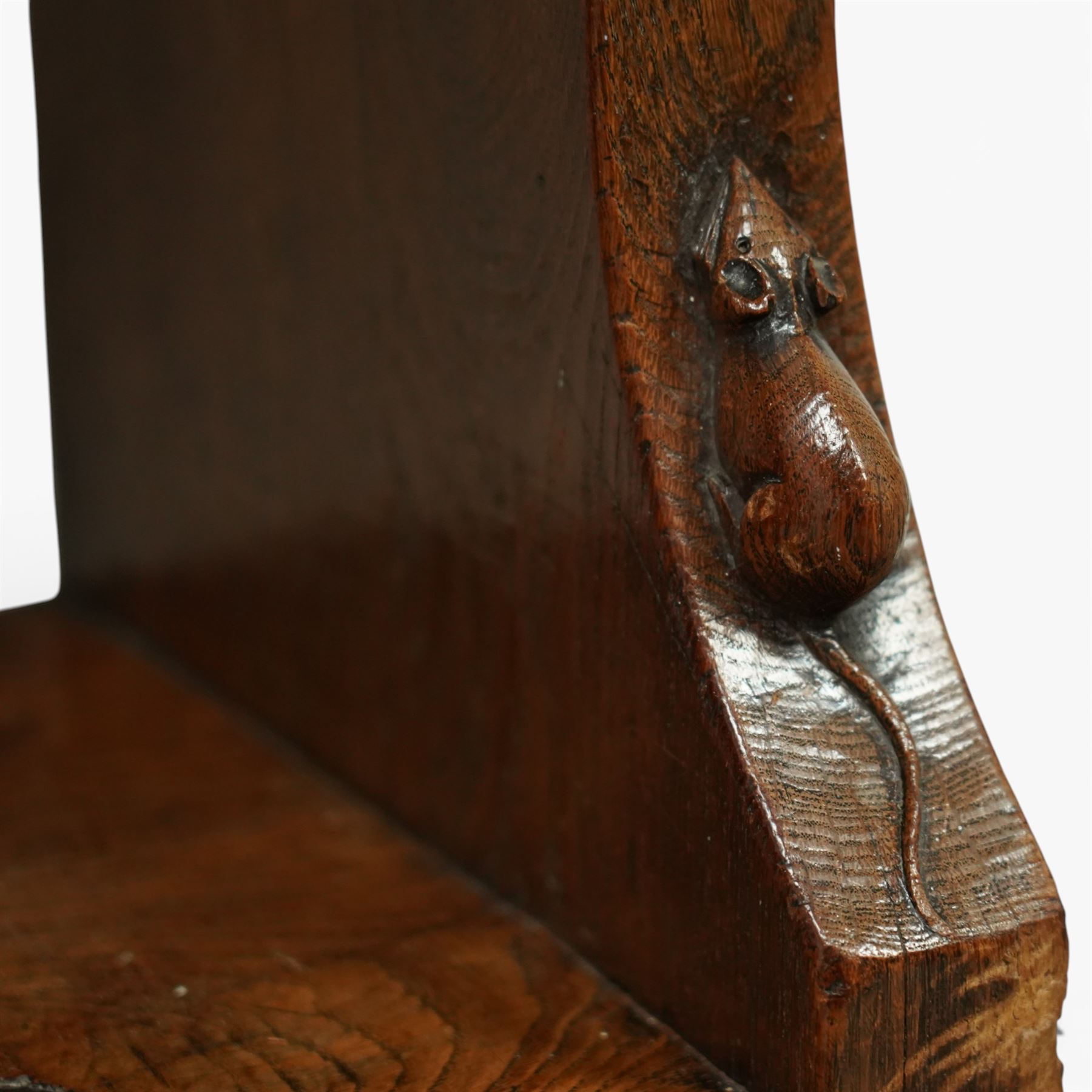 Mouseman - circa 1920s/1930s oak open back 3ft bookcase, the adzed top with scalloped detail, dual depth adzed ends, with two adjustable shelves over two fixed shelves, with carved fat mouse signature, by Robert Thompson of Kilburn