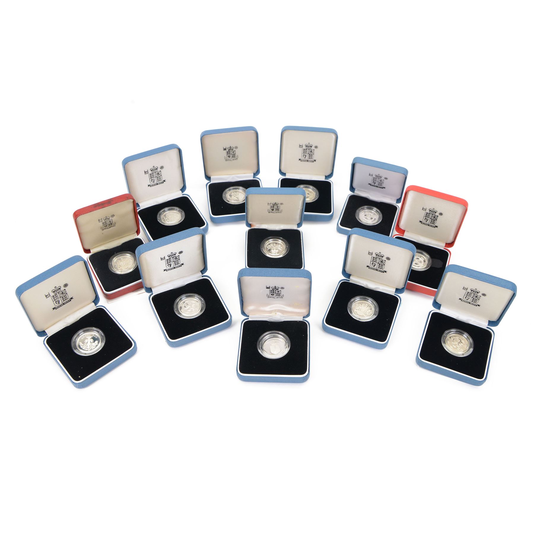 Twelve The Royal Mint United Kingdom silver proof one pound coins, comprising 1983, 1984, 1988, 1989, 1992, 1993, 1994, 1996, 1996 piedfort, 1998, 1999, and 2001, cased with certificates