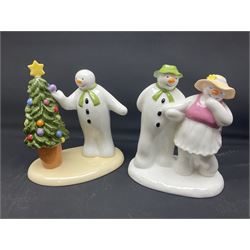 Four Coalport Characters The Snowman figures, comprising Snowman's Surprise, Christmas Cheer with certificate, The Bashful Blush and Dancing at the Party, all with original boxes 