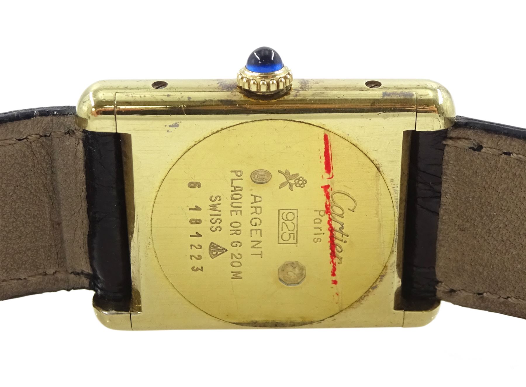Must de Cartier Tank silver-gilt manual wind wristwatch, black dial with Roman hour markers, hallmarked, on Cartier black leather strap, with gilt buckle, boxed with service papers dated 1994