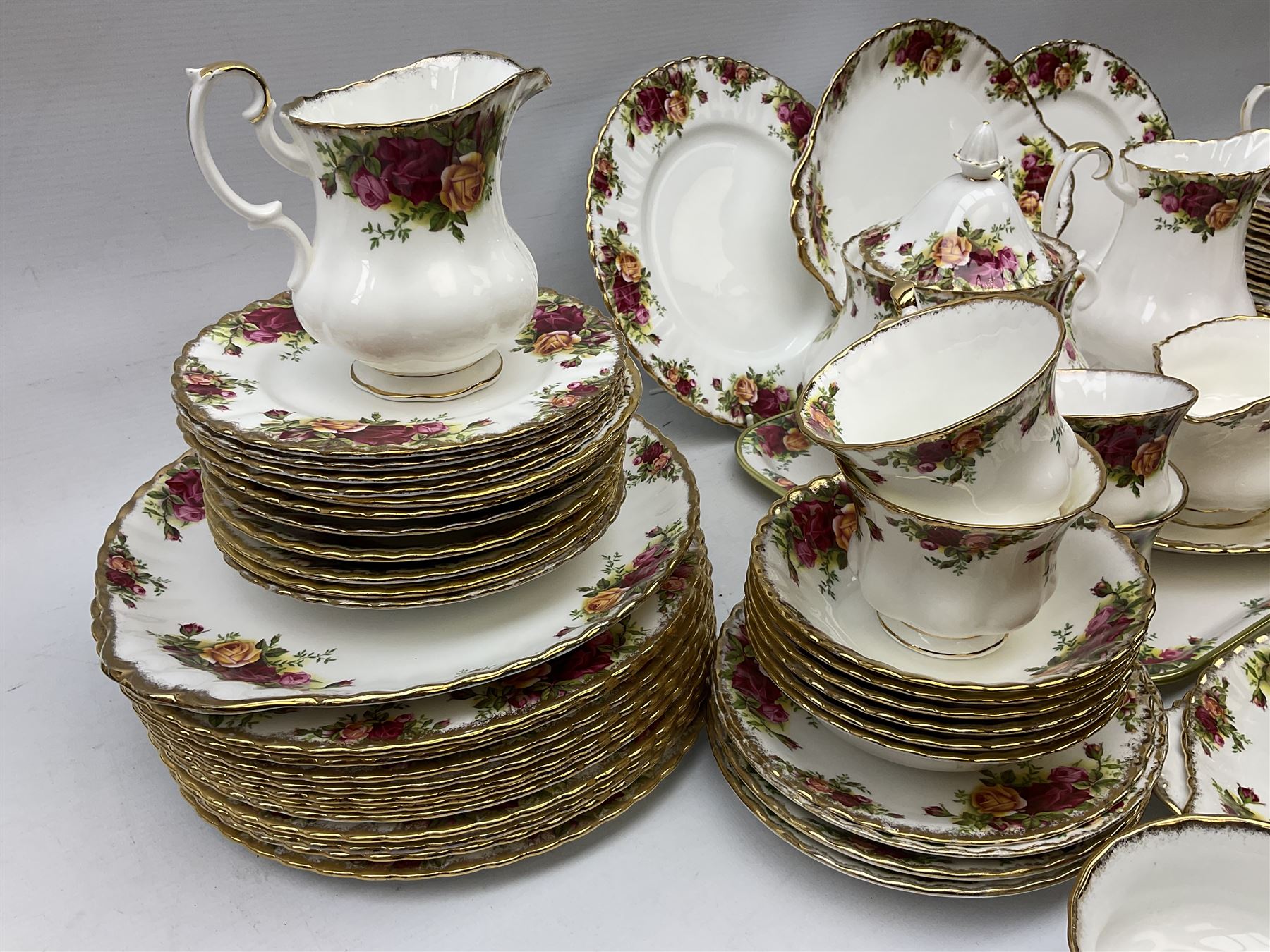 Royal Albert Old Country Roses pattern tea and part dinner service, to include teapot, two open sucriers, two jugs, thirteen cups and saucers, sixteen dessert plates, two cake plates, twelve dinner plates, sauce boat and saucer, etc (approx 114) 