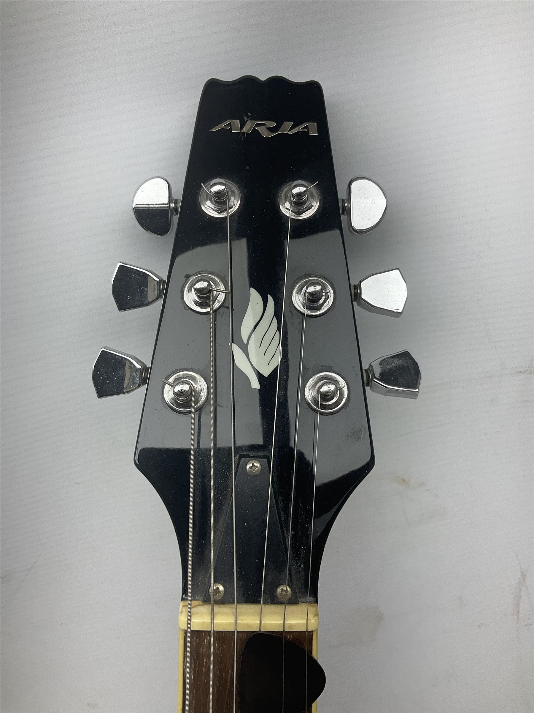 Aria Les Paul style electric guitar, no.037704CH L102cm; with amplifier, soft carrying case and stand; together with various guitar songbooks etc