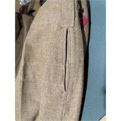 WWII British parachute regiment battle dress uniform, the jacket with shoulder title and Pegasus formation badge to the left arm, shoulder title, Pegasus formation badge and cloth wings to the right, size 3 dated 1943, the trousers size 3 dated 1945 