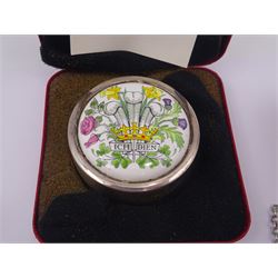 Group of silver, including a commemorative trinket box, with enamel roundel to hinged cover celebrating the marriage of HRH Price of Wales and Lady Diana Spencer by St James' House Company, boxed, a button hole posy holder, propelling pencil, teaspoon, 'Sherry' and 'Brandy' decanter labels and two glass jars with silver covers, all hallmarked, together with an unmarked white metal pill box