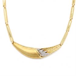 14ct yellow and white gold cubic zirconia abstract design necklace, stamped 585