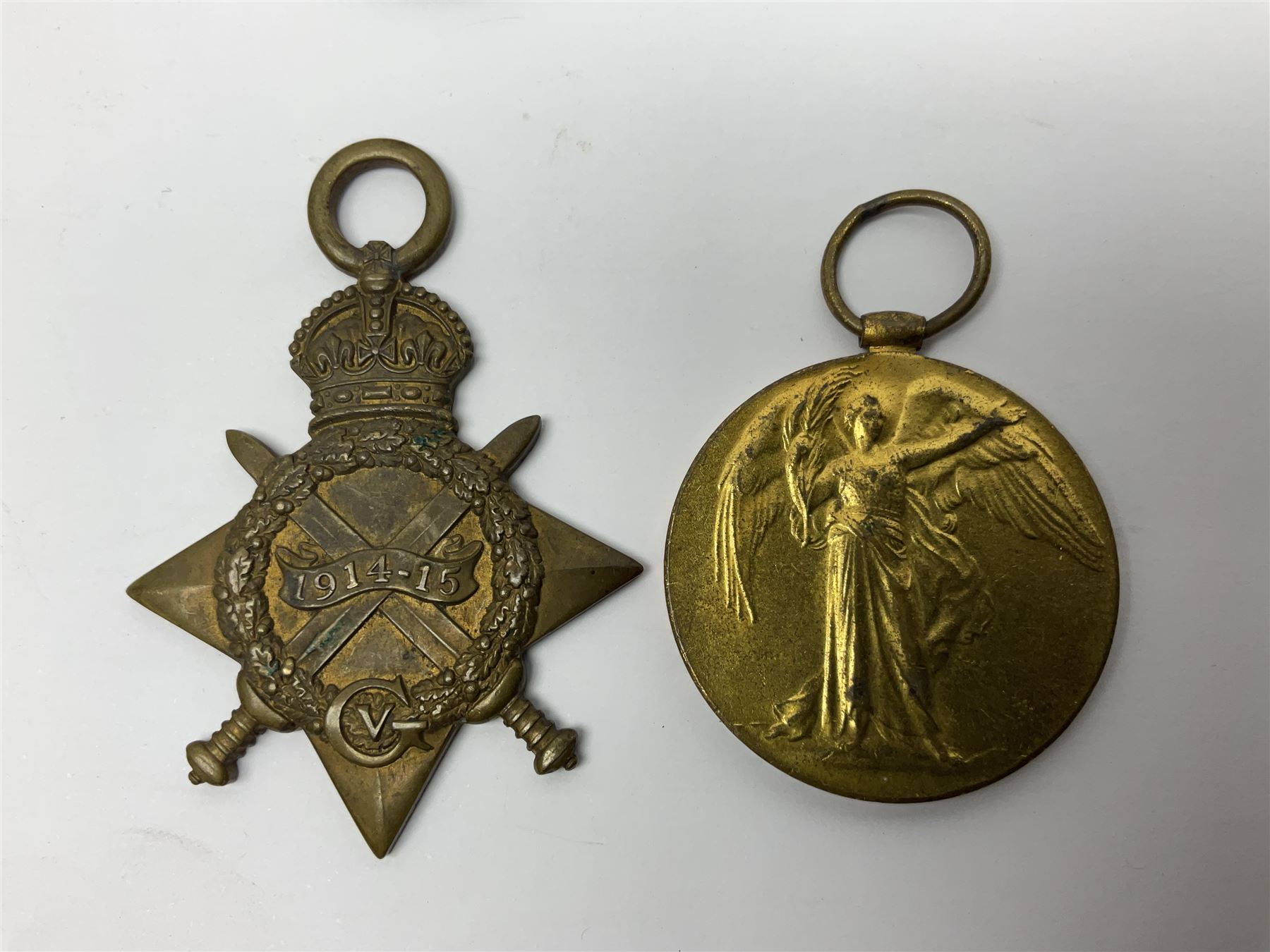 WW1 group of three medals comprising 1914-15 Star awarded to L-Cpl. W.J. Horspool R.War.R., British War Medal and Victory Medal awarded to A. Cpl. W.J. Horspool R.War.R.; WW1 British War Medal awarded to 3-8755 W.O.Cl.2. S. Paterson North'd Fus.; and hallmarked silver and enamel Northumberland Football Association Junior Cup Runners Up fob 1921-22 on silver chain (5)