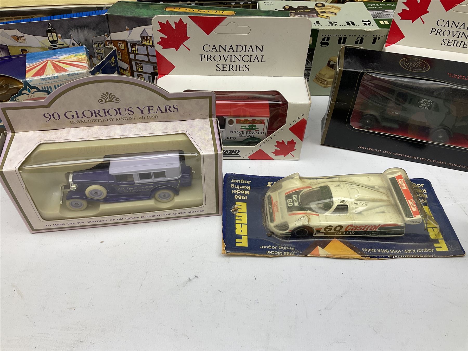 Collection of Diecast model vehicles, including Lledo The Golden Days of the Film Industry limited edition set, Lledo H Samuel boxed vehicle, and other similar examples 