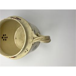 18th century creamware teapot, probably Leeds, with reeded entwined handle and floral finial to the cover, the body with hand painted polychrome decoration of figure to one side, and floral spray to the other, collectors paper label beneath inscribed Leeds Pottery, H11.5cm