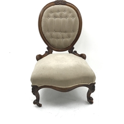 Victorian walnut framed nursing chair, shell carved cresting rail, upholstered in a buttoned fabric, cabriole feet, W60cm