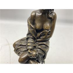 Art Deco style bronze modelled as a female figure seated upon a chair holding an apple, after 'Pierre Collinet', H28cm