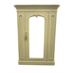 Victorian white painted wardrobe, the projecting cornice over centre mirror glazed door, the interior fitted with drawer and two hinged compartments, plinth base