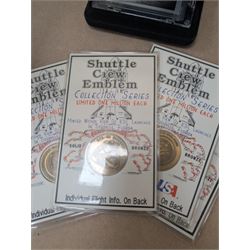 Nasa Space Shuttle program commemorative items, including album of stamp covers, telephone cards, five Shuttle Crew Emblem Collector's Series medallions, Maiden Flights bronze medallions, Missions of the Orbiter Challenger set of medallions and Apollo series medallions
