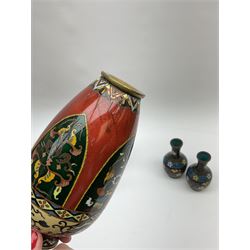 Group of cloisonné to include vase of ovoid form decorated with panels of exotic birds amongst flowers, beneath a foliate band upon a peach ground, two pairs of vases to include lidded examples and a miniature jug decorated with butterfly amongst foliage, tallest example H14.5cm