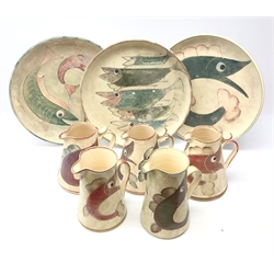  Five Yorkshire Moorlands Pottery Fish design spongeware jugs of tapered form, H21cm max and three matching circular platters, D41cm   