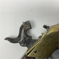 19th Century percussion eprouvette or gunpowder tester, with foliate engraved brass box lock and calibrated ratcheted wheel, steel trigger guard and walnut bag butt, L14cm