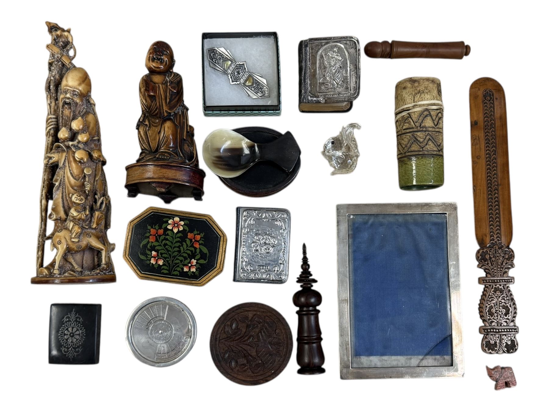 Silver photograph frame, two bibles with silver covers and other collectables including carved figures, 50 year calendar, etc 