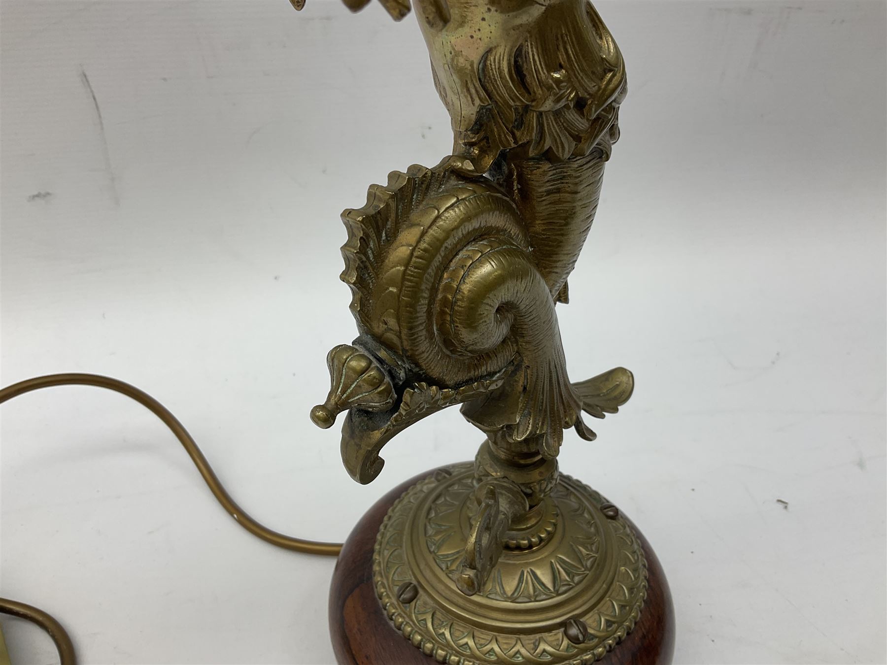 Victorian gilt bronze converted gas lamp in the form of  mythical winged mermaid upon a circular oak base, with a frilled green glass shade, H44cm