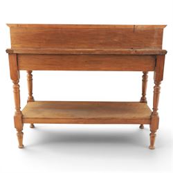 Edwardian oak serving table, raised panelled back over moulded rectangular top, fitted with two frieze drawers with brass drop handles, fluted front uprights, on turned supports united by potboard undertier