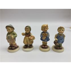 Thirty Hummel figures by Goebel, to include Saluting the Peacekeepers of Operation Joint Endeavor, on wooden plinth, Call to Glory, Celebrate with Song and Soldier Boy