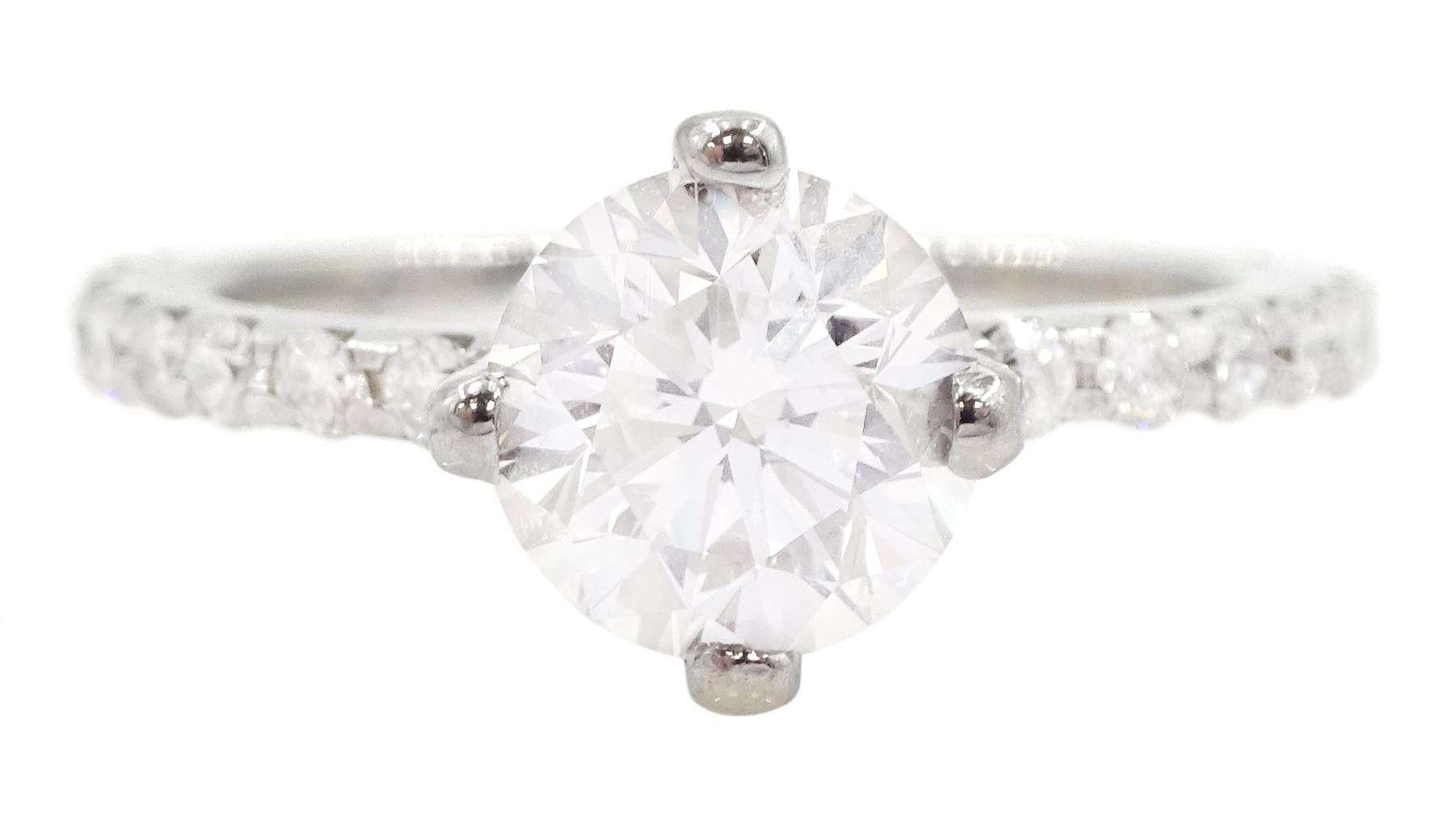 Platinum single stone round brilliant cut diamond ring, with diamond set shoulders and diamond set gallery, principal diamond approx 1.00 carat
