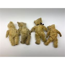 Four English small teddy bears 1930s-50s including three by Chiltern and one other, each with swivel jointed head, glass type eyes and vertically stitched nose and mouth (one with plastic dog type nose) and jointed limbs, two with velvet paw pads and two with rexine, average H12