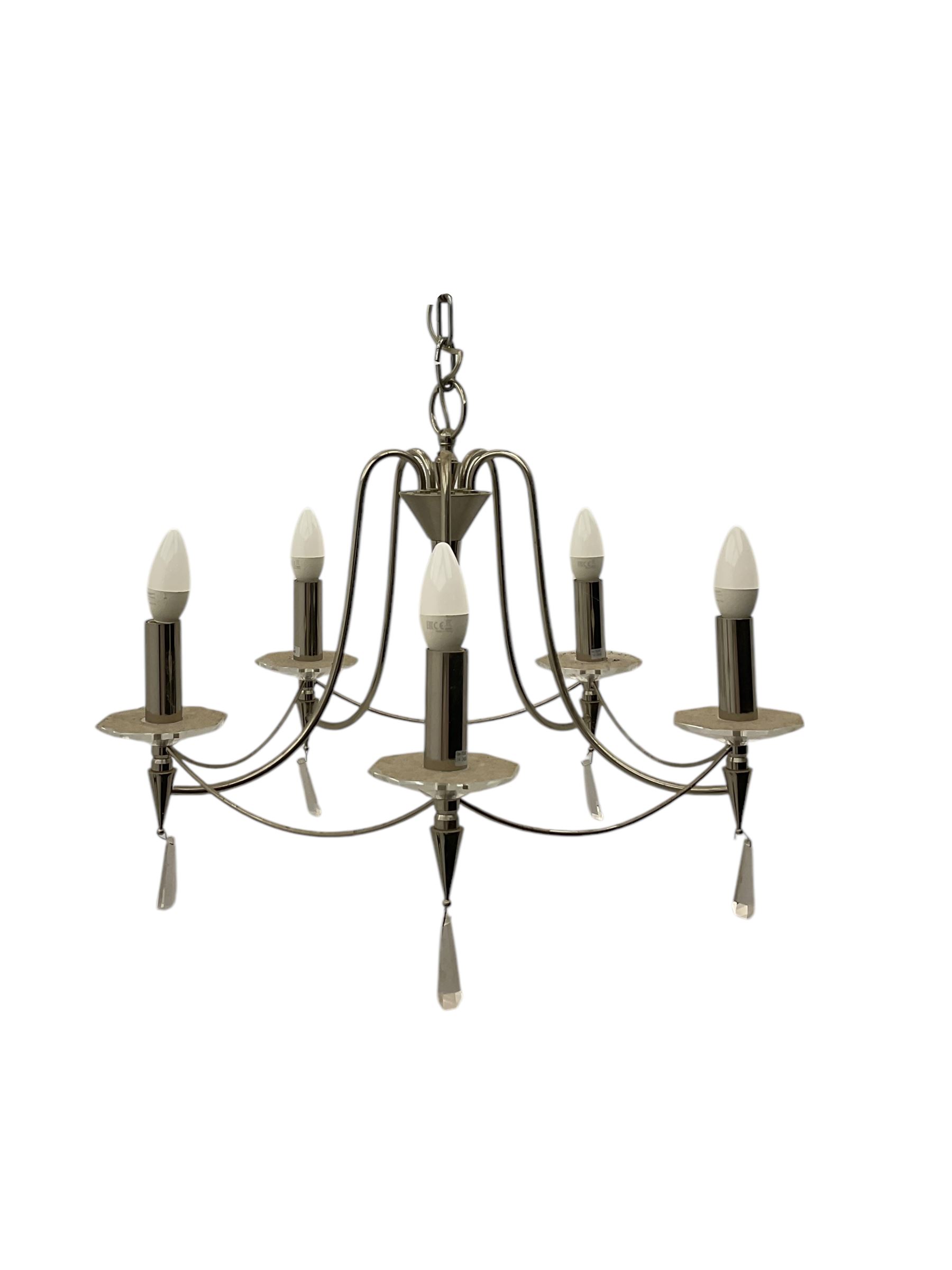 Contemporary black wrought iron six-light chandelier with drip trays and faux candle sleeves; polished chrome six-light chandelier with crystal droplets and cylindrical candleholders (2)