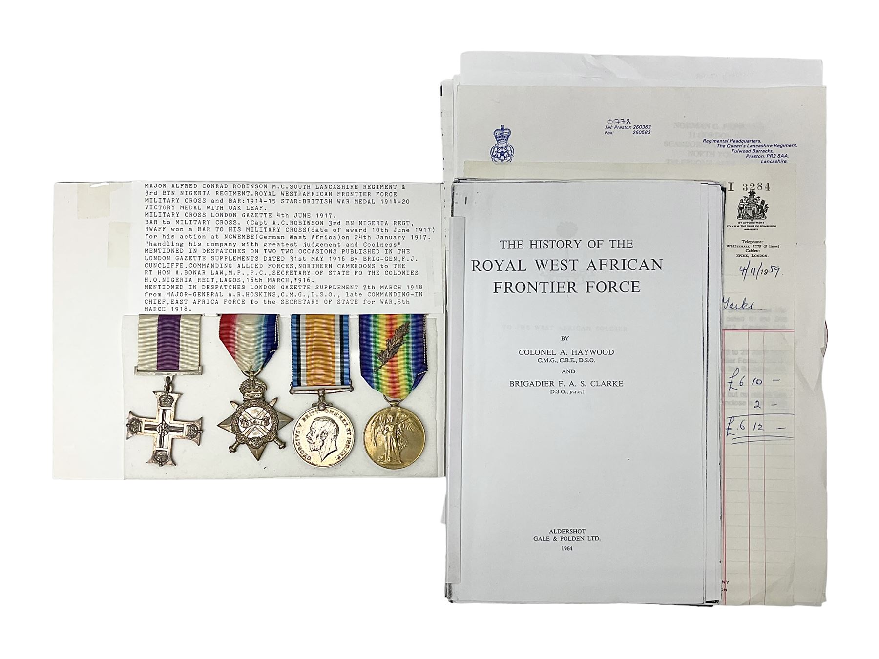 WWI Military Cross group of four awarded to Major Alfred Conrad Robinson South Lancashire Regiment and 3rd Battalion Nigeria Regiment Royal West African Frontier Force comprising MC, British War Medal and Victory Medal with oak leaf, and 1914-15 Star (to Lieut. A.C. Robinson); Military Cross London Gazette 4th June 1917. Bar to Military Cross (Capt. A.C. Robinson 3rd Bn. Nigeria Regt. RWAFF won a bar to his Military Cross (date of award 10th June 1917) for his action at Ngwembe German East Africa on 24th January 1917 for 'Handling his company with great judgement and coolness'. Recommended for a bar to his MC dated 10th June 1917 but never recorded (copy bar included with the medals).Mentioned in despatches on two occasions. Published in the London Gazette Supplements dated 31st May 1916 by Brig-Gen F.J. Cunliffe, commanding Allied Forces Northern Cameroons to the Rt.Hon. A. Bonar Law MP P.C. Secretary of State for the Colonies, H.Q. Nigeria Regiment, Lagos, 16th March 1916; and again London Gazette Supplement 7th March 1918 from Major-Gen A.R. Hoskins C.M.G. D.S.O. Late Commander-in-Chief East Africa Force to the Secretary of Stae for war 5th March 1918; together with an extensive archive of research information and the original bill of purchase from Spink & Son dated 4/11/1959