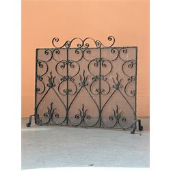 19th century wrought iron and mesh spark guard, decorated with conforming 'S' scrolls and standing on four out splayed supports (H53cm)  - COLLECTION BY APPOINTMENT FROM: The White House, Thirsk Road, Easingwold, York, YO61 3NF - CALL 01723 507111 TO ARRANGE