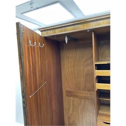 Waring and Gillow - early to mid 20th century figured walnut Gentleman’s wardrobe, two doors enclosing various compartment, mirror, drawers and hanging space, labelled 