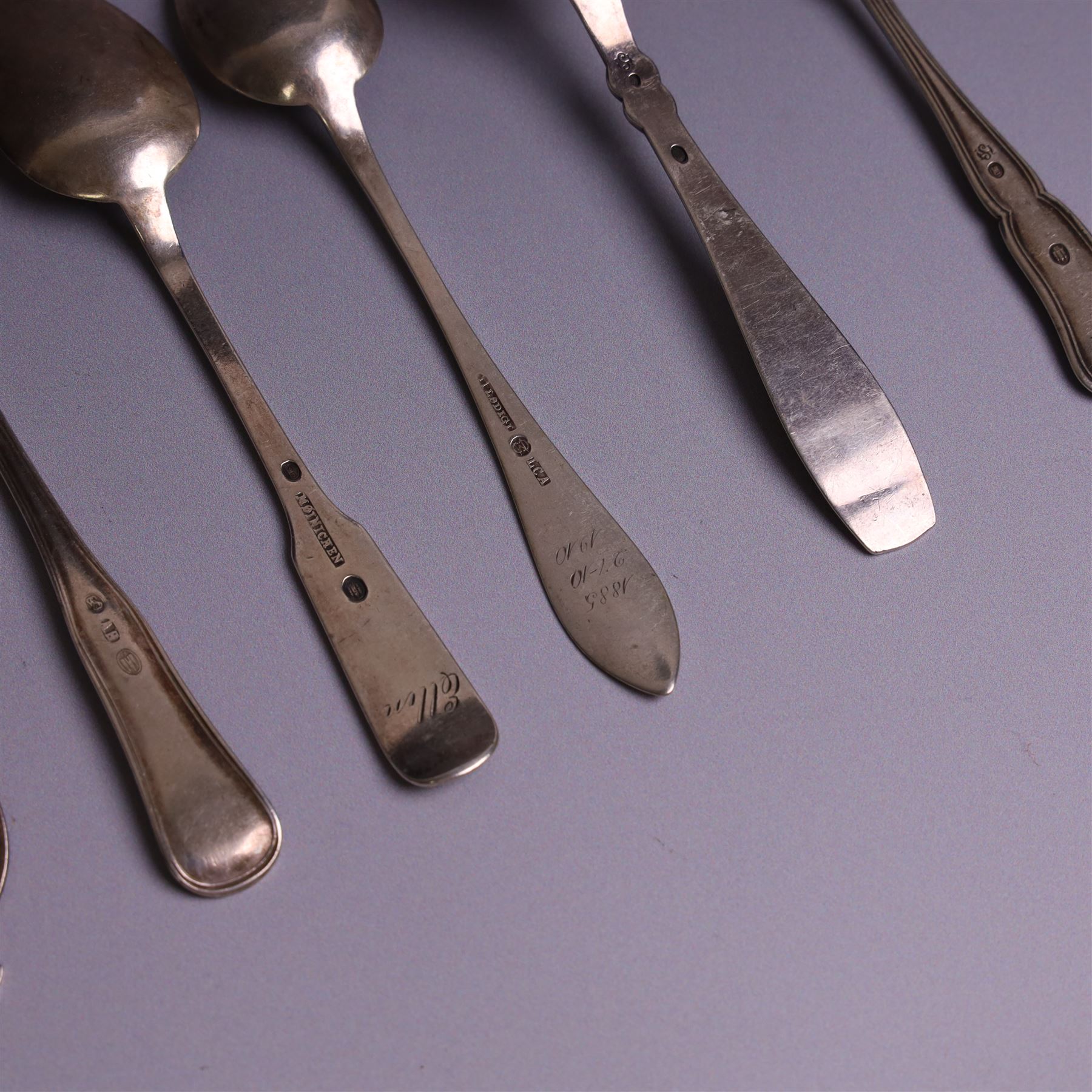 Collection of continental silver spoons, including set of six enamel demitasse spoons, stamped 925 and two enamel year spoons one by Arne Hansen, the other by Anton Michelsen