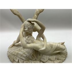 Alabasta figure group of an angel holding lightly draped female figure, H38cm. 