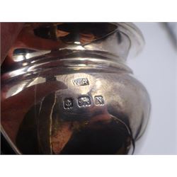 1930s three piece silver tea service, comprising teapot, milk jug and twin handled open sucrier, of oval bellied form, the teapot with Bakelite type handle and finial, hallmarked William Adams Ltd, Birmingham 1937, teapot H16cm