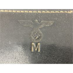 Pair of WWII German U-boat binoculars probably 7 x 50 by Leitz, with rubber eye piece protector covers and leather case stamped with Kriegsmarine mark to the lid and dated 1944, with leather strap.