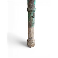 19th century circular cast iron gate post with finial, painted in distressed green finish